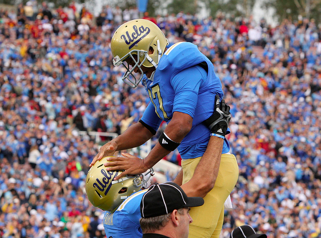 UCLA QB Brett Hundley celebrates an early touchdown. (James Santelli/NT)