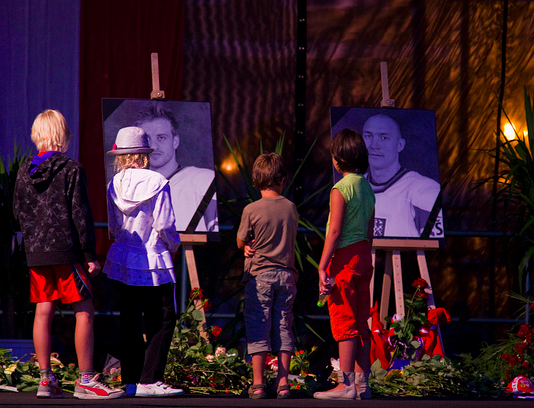 Mourners gather at a memorial for Czech players Jan Marek and Josef Vasicek. (Steve Emry/Creative Commons)