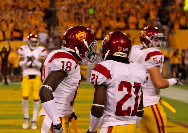 Bailey (18) and Robey (21) couldn't get USC a victory over Luck. (James Santelli/NT)