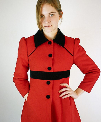 A red coat like this will keep you warm and stylish. (flickr.com)