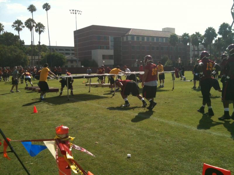 USC linemen do drills at fall camp. The team's offensive line has been in flux in practice lately. (Jacob Freedman/Neon Tommy)