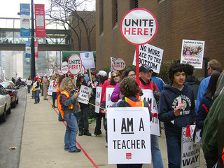 Tensions between school officials and teachers, seen here demonstrating last year, have been high ever since Rahm Emanuel took office. (Courtesy Creative Commons/ Jean Paul Holmes)