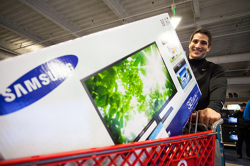 A shopper buying a TV on Black Friday, Nov. 23, 2012 (Creative Commons). A shopper buying a TV on Black Friday, Nov. 23, 2012 (Creative Commons).