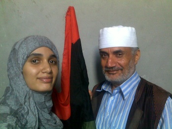 Khadija M. Ali, pictured here with her father, is a journalist for The Tripoli Post. She risked her life during last year's revolution to report from the demonstrations. (Submitted photo) Khadija M. Ali, pictured here with her father, is a journalist for The Tripoli Post. She risked her life during last year's revolution to report from the demonstrations. (Submitted photo)