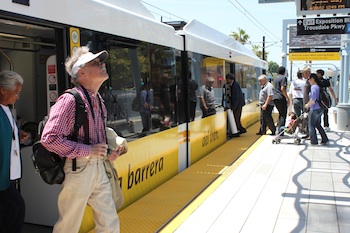 Riders exit onto the platform at the Expo Park/USC stop. (Catherine Green/Neon Tommy)