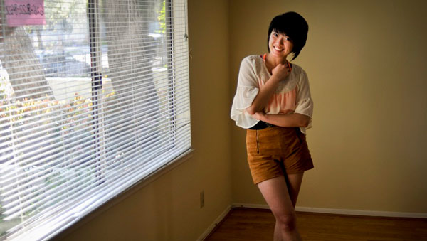 Tina Xiao in the living room of her property in Pasadena (Yasser Zhang/KQED)