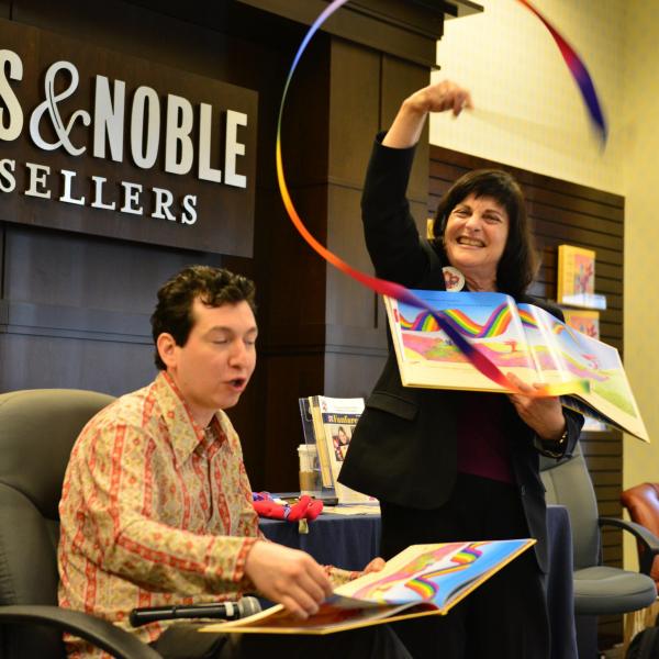 Barbara Saltzman reads "The Jester" aloud. (Wilson Pumpernickel)