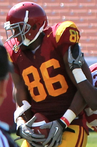Why is Antonio Gates wearing a Trojan No. 86 instead of a Charger No. 85? (Shotgun Spratling/Neon Tommy) Why is Antonio Gates wearing a Trojan No. 86 instead of a Charger No. 85? (Shotgun Spratling/Neon Tommy)