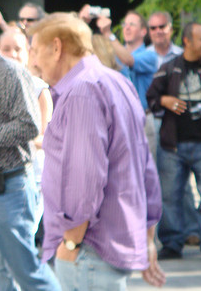 Dr. Jerry Buss fittingly wearing purple before Game 4 of the 2008 NBA Finals. (Juan E/Creative Commons)