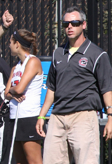 Brian Eisenberg looks on in his first season as an NCAA coach and fifth with the team. (Larry Newman/Chapman Athletics)