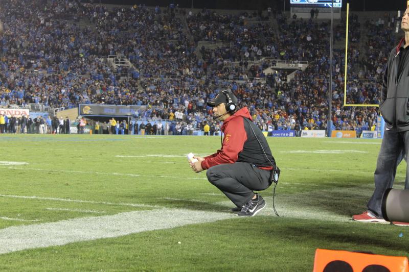 Steve Sarkisian, seen here praying for a gameplan, failed to adapt Saturday. (Jeremy Bergman/Neon Tommy)