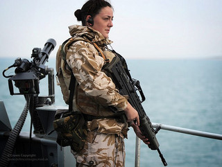 Department of Defense statistics report women make up 14 percent of active military.