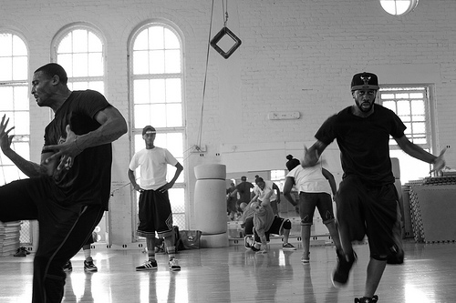 Lil' C (right) prepares for an upcoming performance. (photo by Dan Carino)