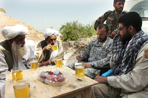 Special Forces company commander met with village elders and members of the Afghan National Army Corps in 2007 to discuss military operations in the Sangin District. It is the same area where three U.S. soldiers were killed Friday. (U.S. Army/Flickr) Special Forces company commander met with village elders and members of the Afghan National Army Corps in 2007 to discuss military operations in the Sangin District. It is the same area where three U.S. soldiers were killed Friday. (U.S. Army/Flickr)