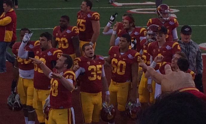 USC celebrating after beating Fresno State in last year's Las Vegas Bowl. (Neon Tommy)