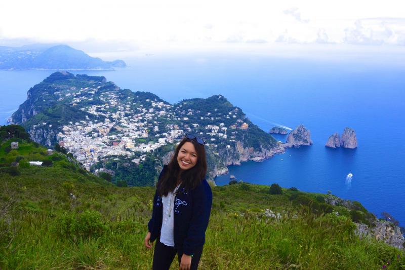 Boston College senior Carol Liang in Capri, Italy. On semesters abroad, students are often spotted taking turns staging individual photoshoots for each other for Facebook and Instagram. (Courtesy of Carol Liang) 