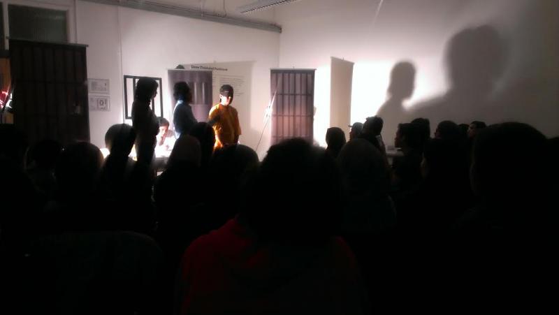 A performance of "Bilik Sulit," translated to "The Confidential Room," in Brixton. Forums on Malaysian politics were often held after the group's performances to encourage awareness and debate. (Courtesy of Adam Adli) A performance of "Bilik Sulit," translated to "The Confidential Room," in Brixton. Forums on Malaysian politics were often held after the group's performances to encourage awareness and debate. (Courtesy of Adam Adli)