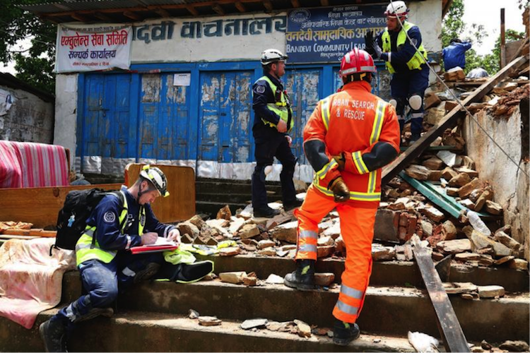 The UK's International Search and Rescue team in Chautara, Sindhupalchok District, northeast of Kathmandu, Nepal. (Creative Commons/DFDI)