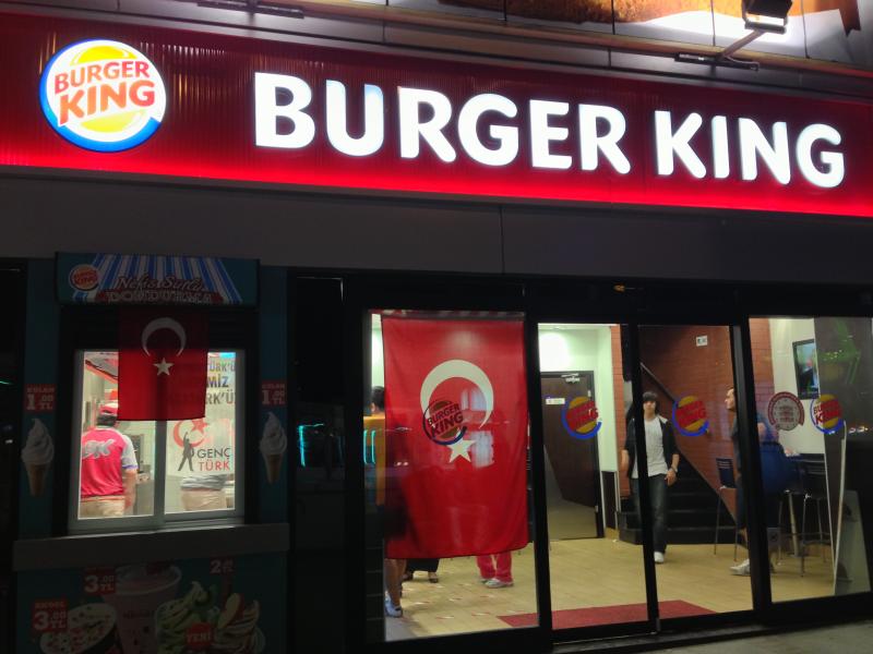 (Burger King uses these flags and posters to protect themselves from graffiti/Tahsin Hyder, Neon Tommy)