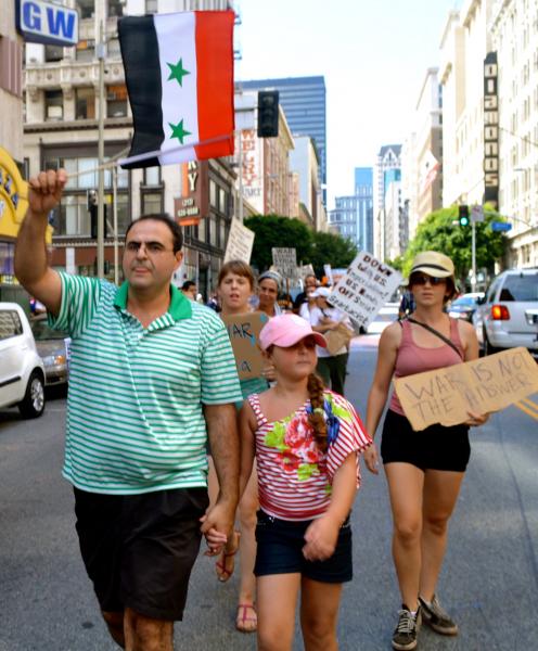 (Sam Tah, a Syrian native, marching in L.A./Brianna Sacks, Neon Tommy)
