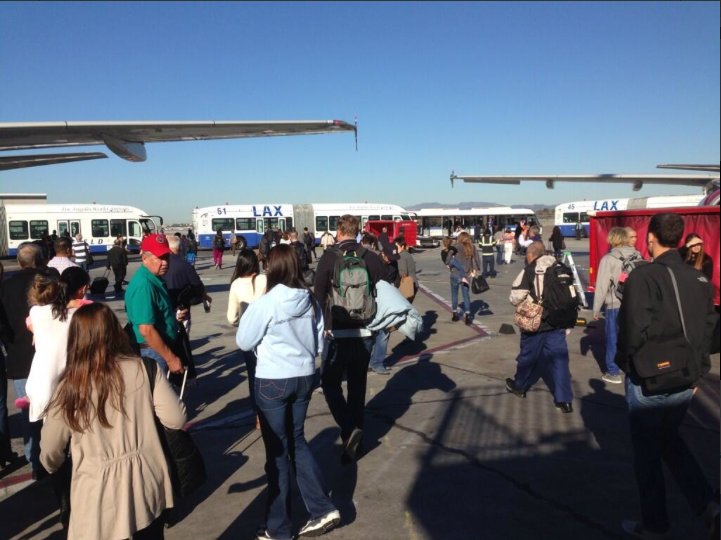 LAX passengers were shuttled away from Terminal 3, where the shooting took place. (@ToryBelleci/Twitter) LAX passengers were shuttled away from Terminal 3, where the shooting took place. (@ToryBelleci/Twitter)