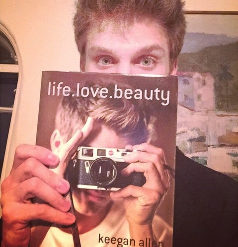 Keegan Allen and his gorgeous eyes model his new photobook, life.love.beauty (Instagram/@keeoone).