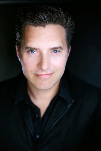 Author Shane Kuhn says he puts a "ton" of himself into protagonist John Lago (Photo courtesy of Sasha Gullish). Author Shane Kuhn says he puts a "ton" of himself into protagonist John Lago (Photo courtesy of Sasha Gullish).