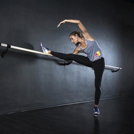 Lolo Jones is trading in her running shoes for some killer heels (Twitter/@Redbull).