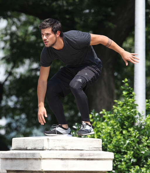 Taylor Lautner's character Cam ditches his bike for a pair of running shoes (Saban Films). Taylor Lautner's character Cam ditches his bike for a pair of running shoes (Saban Films).