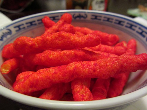Flamin' Hot Cheetos have been banned at several schools because of its lack of nutrients (Calgary Reviews / Creative Commons)