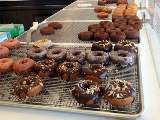 Customers getting the "DIY" donut start off with their choice of donut, ranging from traditional donuts to cake donuts (Kelli Shiroma / Neon Tommy). Customers getting the "DIY" donut start off with their choice of donut, ranging from traditional donuts to cake donuts (Kelli Shiroma / Neon Tommy).