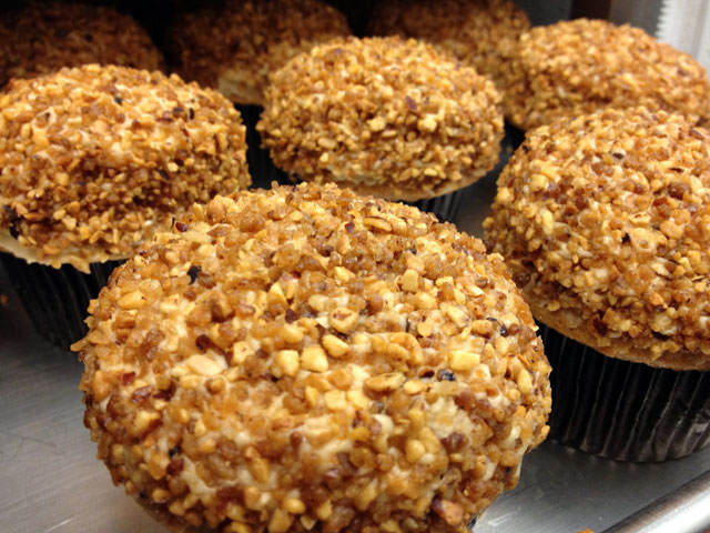 These “Brown Sugar Praline” cupcake features a moist caramel cake topped with brown sugar frosting and crunchy praline bits (Kelli Shiroma / Neon Tommy). These “Brown Sugar Praline” cupcake features a moist caramel cake topped with brown sugar frosting and crunchy praline bits (Kelli Shiroma / Neon Tommy).
