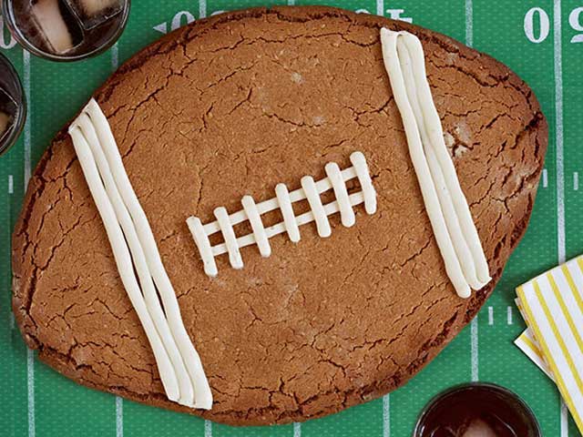 This larger-than-life peanut butter football cookie will score a touchdown among all your party guests (Photo Courtesy of FoodNetwork.com).