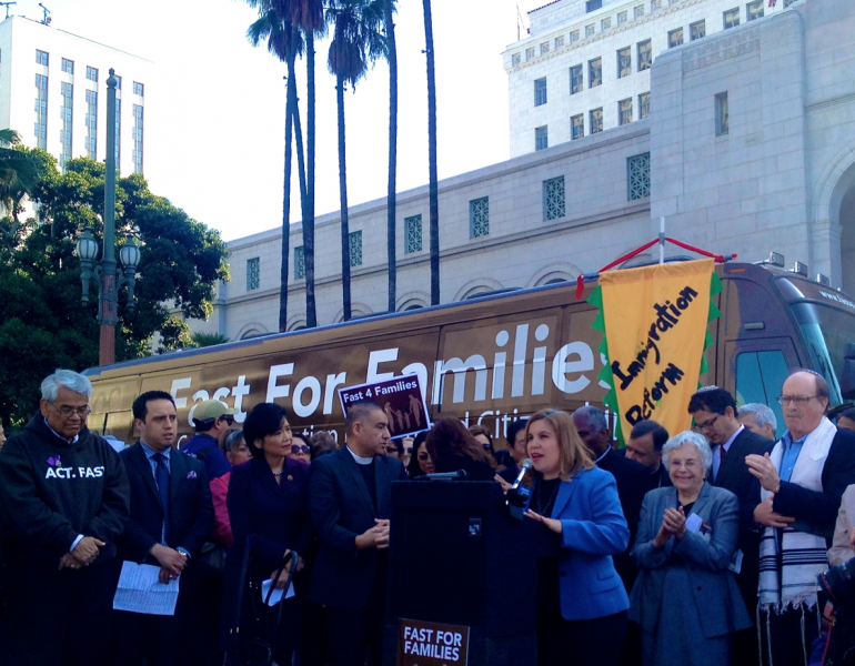 Bishop Minerva Carcaño took to the podium outside L.A.'s City Hall. (Ashley Riegle/NeonTommy)