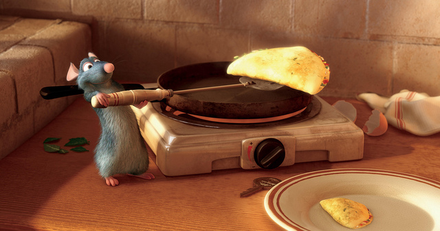 Rémy the rat makes Linguini an omlette (Ben.Hannis / Flickr Creative Commons).