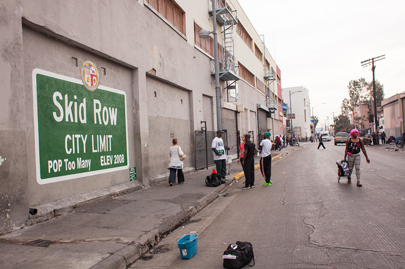 Zeigler, local activist General Jeff and artists Wild Life, Como and Tre collaborated in February on the Skid Row City Limits mural at San Julian and Sixth Streets. (Photo courtesy General Jeff) Zeigler, local activist General Jeff and artists Wild Life, Como and Tre collaborated in February on the Skid Row City Limits mural at San Julian and Sixth Streets. (Photo courtesy General Jeff)