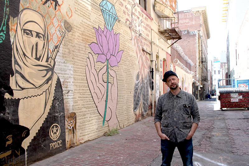Photographer Stephen Zeigler is Winston Street's unofficial curator. (Chrystal Li/Neon Tommy) Photographer Stephen Zeigler is Winston Street's unofficial curator. (Chrystal Li/Neon Tommy)