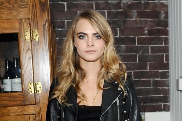 Cara Delevingne will make her major film debut in the adaptation of John Green's "Paper Towns." (@ELLEmagazine / Twitter)