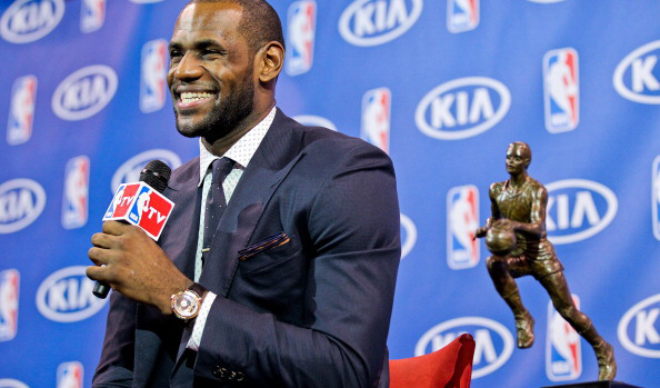 LeBron has kept smiling as the world holds its breath for him to take the podium. (Issac Baldizon/Getty Images)