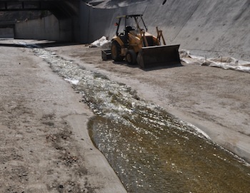 Construction in the channel near Highland Park should continue through the end of the year. (Braden Holly)