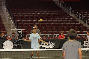 Asher playing tennis. Scarlett Zhiqi Chen / Neon Tommy. Asher playing tennis. Scarlett Zhiqi Chen / Neon Tommy.