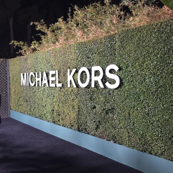 Michael Kors backdrop at the "Young Hollywood" Launch Party (Jenny Kim/Neon Tommy) Michael Kors backdrop at the "Young Hollywood" Launch Party (Jenny Kim/Neon Tommy)
