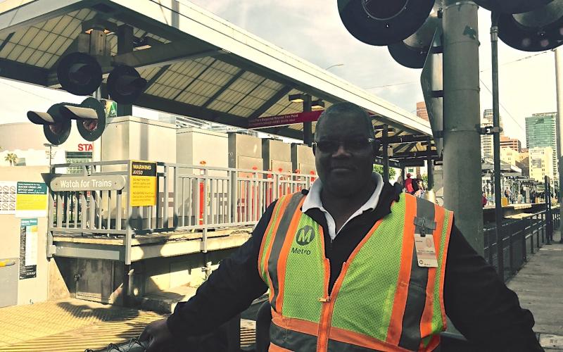 Metro Safety Ambassador Fredrick Williams at his Pico Station post. (Daniel Jimenez/Neon Tommy) Metro Safety Ambassador Fredrick Williams at his Pico Station post. (Daniel Jimenez/Neon Tommy)