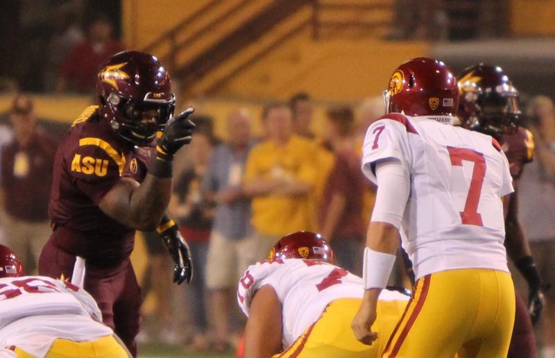 Arizona State LB Vontaze Burfict stares down USC QB Matt Barkley. (James Santelli/Neon Tommy)