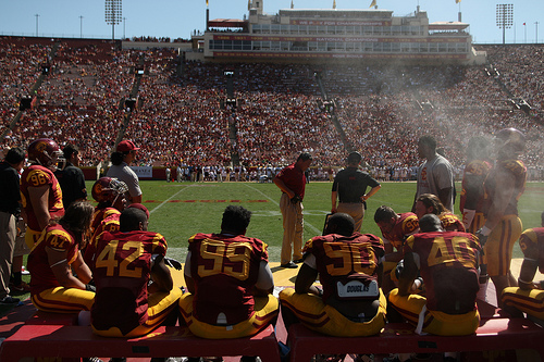Orgeron (far center) will have to rally more than just his defensive line. (Kevin Tsukii/Neon Tommy)
