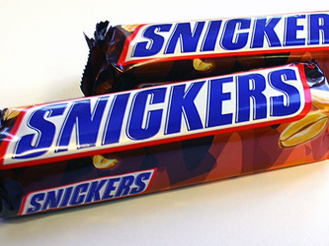 Snickers features a delectable combo of milk chocolate, peanuts and caramel (Leonid Mamchenkov / Flickr). Snickers features a delectable combo of milk chocolate, peanuts and caramel (Leonid Mamchenkov / Flickr).