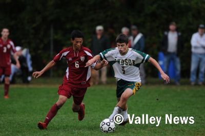 Matthew Tufts, 7, battles for control of the ball in a 3-1 Windsor victory over Black River. (James M. Patterson/Valley News) Matthew Tufts, 7, battles for control of the ball in a 3-1 Windsor victory over Black River. (James M. Patterson/Valley News)